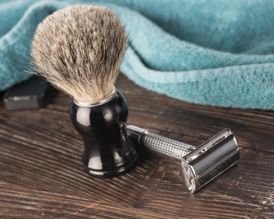 Double edged razor in bathroom setting for a wet shave